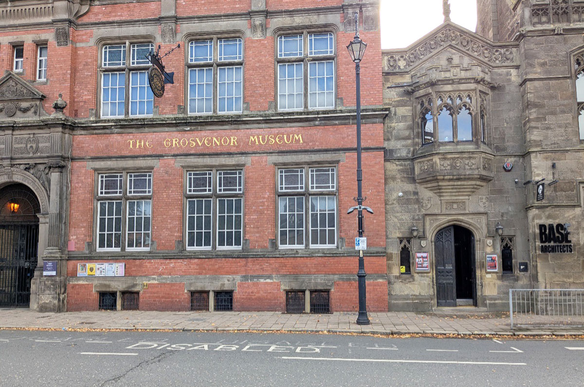 A photograph of outside The Grosvenor Museum showing a disabled parking bay painted onto the road